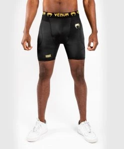 Venum G-Fit Compression Shorts - Black/Gold TRAINING GEAR